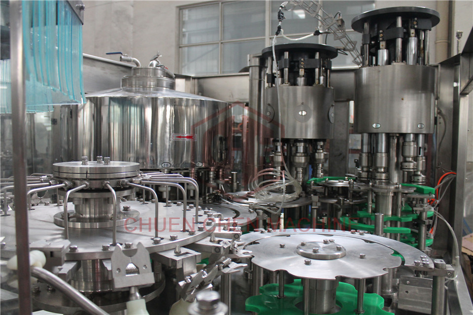 Double Head Liquid Bottle Filling Machine Rotary Volumetric Bottle